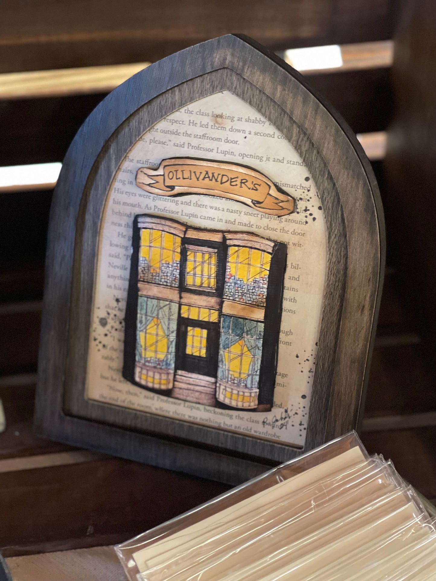 Framed Ollivanders Watercolor Book Page Art