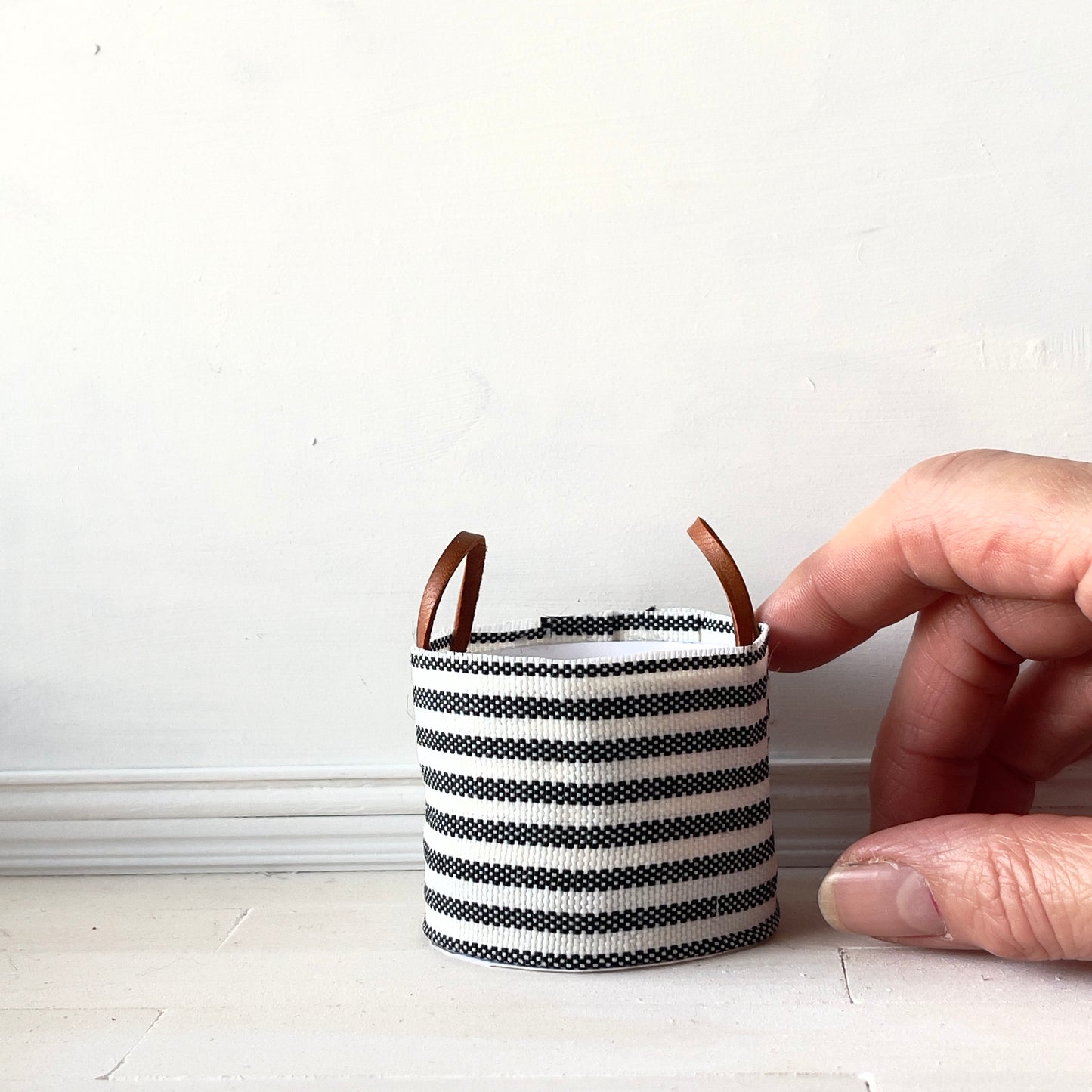 Striped leather handles blanket basket